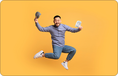 Man holding money, jumping